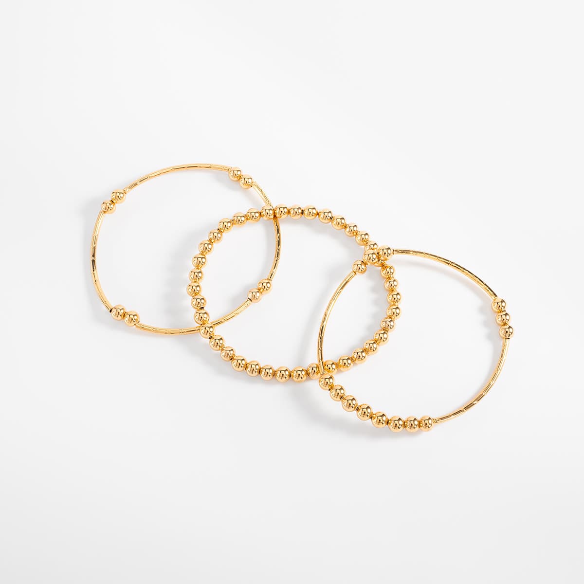 Pulsera en baño de oro esferas diseño contemporaneo