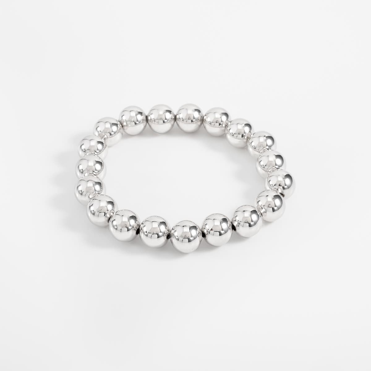 Pulsera en baño de rodio esferas lisas diseño minimalista
