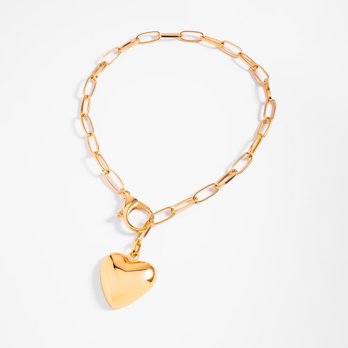 Collar en baño de oro con eslabones y dije de corazón sólido